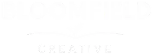 Bloomfield Creative logo in white with transparent background